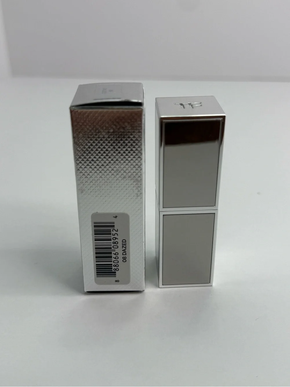 Tom Ford extreme lip spark 08 Dazed. Vibrant pink/purple with shimmer.